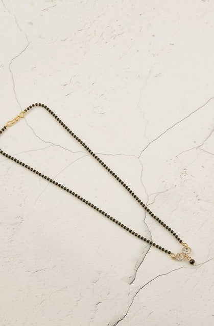 Multicolor brass gold plated mangalsutra pendant necklace featuring dual crystal design and black beaded chain