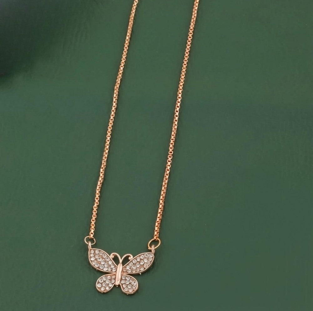 Gold plated brass butterfly pendant necklace set, featuring pave crystal accents on a delicate chain