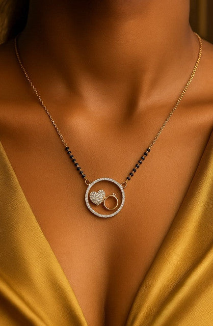 Multicolor brass gold plated mangalsutra pendant necklace featuring a heart and ring design on a black beaded chain