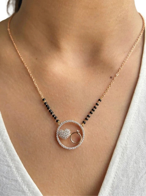 Multicolor brass gold plated mangalsutra pendant necklace featuring a heart and ring design on a black beaded chain