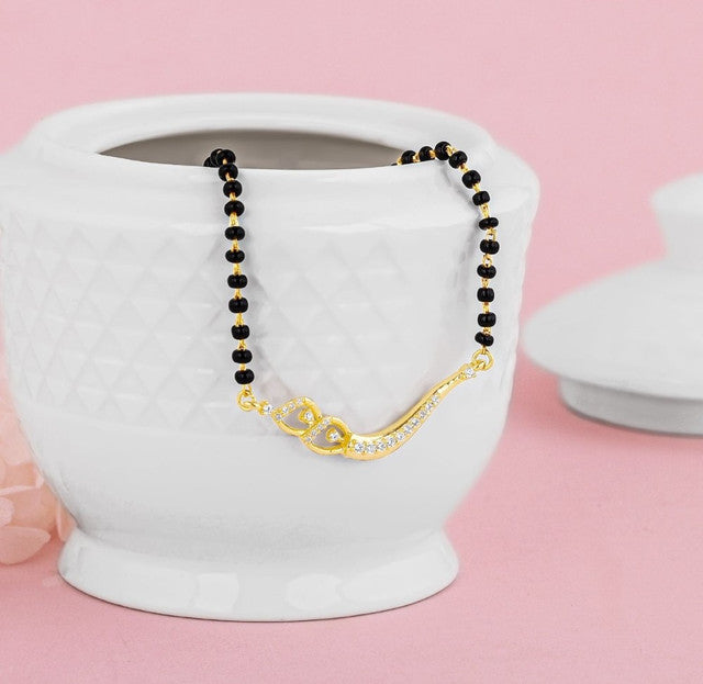 Multicolor brass gold plated mangalsutra pendant necklace featuring a curved swirl heart design and black beaded chain