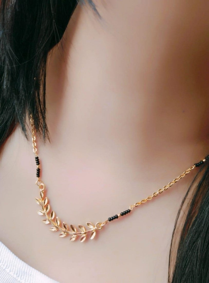 Multicolor brass gold plated asymmetric leaf branch mangalsutra pendant necklace with black beaded chain