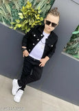 Black denim jacket, young boy standing against wall