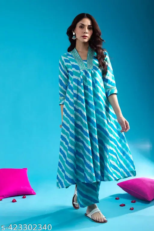 Ethnic Women's cotton lahariya print kurti & palazzos set, three-quarter sleeves, dyed/washed net fabric, Indian embroidery on display
