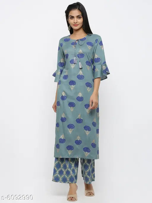 Women's printed rayon kurti with three-quarter sleeves, vibrant Indian pattern, available in M size (bust 38in, length 44in)