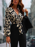 Classic modern women's jumpsuit in Lycra, long sleeves, printed net pattern. Fits S (36in bust, 50in length, 34in waist) or M (38in bust, 50in length, 36in waist). Indian made