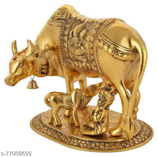 Medium quality brass Kamdhenu cow figure showpiece decor, adorned with deities, Indian origin
