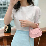 Baby pink sling bag with a silver zipper