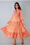 Peach and gold floral kameez with long ruffled skirt