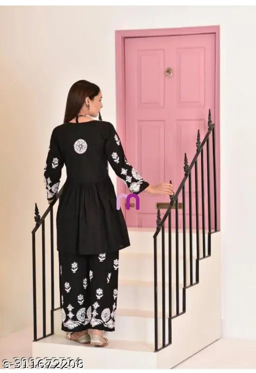 Rayon kurta and palazzos set, embellished with net embroidery, single piece in black, three-quarter sleeves, sizes S-XXL, Indian fashion