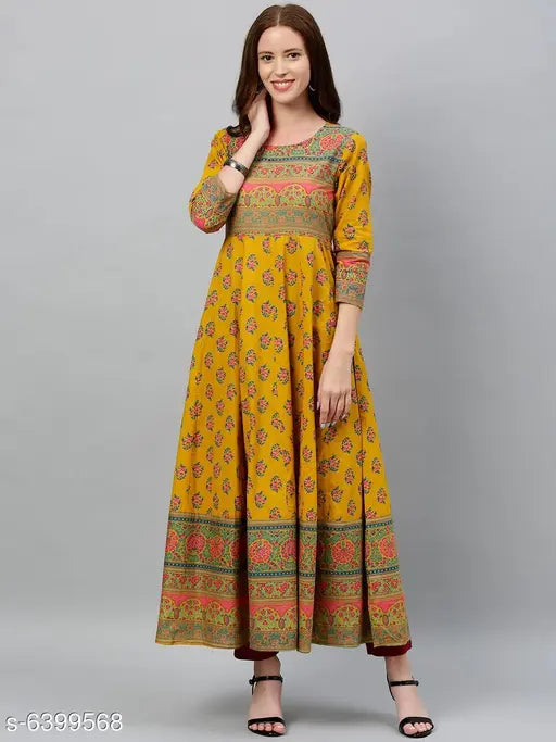 Women's cotton flared printed mustard kurti, three-quarter sleeves, vibrant Indian fashion accessory