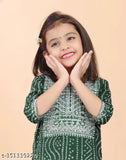 Girls printed rayon kurta and sharara set, calf length A-line top with three-quarter sleeves, India origin