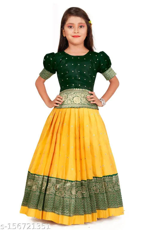 Cotton silk baby girl pattu pavadai lehenga choli set, featuring woven design and golden zari work. Traditional Indian attire with jacquard-designed skirt, comfortable inner lining, suitable for various occasions