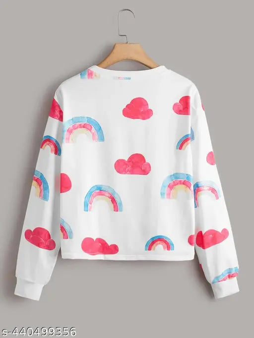 Rainbow print women's long sleeve sweatshirt, soft, breathable fabric, vibrant rainbows, fluffy clouds, casual wardrobe essential