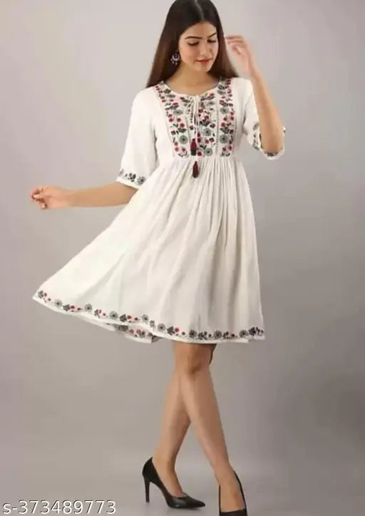 White cotton embellished skirt with ruffled hem