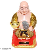Golden plastic Laughing Buddha moving head with waving fan, solar-powered garden ornament from India
