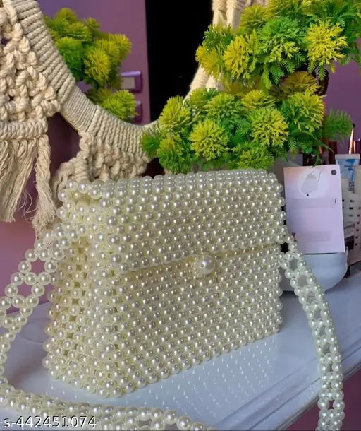 Cream pearl handbag with bead accents, shoulder strap, fashion accessory