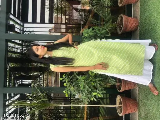 Designer-stitched green cotton Leheriya kurta set with palazzos, gota work accent, sleeveless, printed net style. India origin