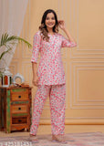 Pink rayon night suit for women and girls, featuring three-quarter sleeves and a printed net design. Perfect for cozy nights. Made in India