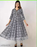 Black gown with long sleeves and flared skirt