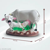 Resin cow and calf idol, symbolizing prosperity and Vatsalya. Handmade home office decorative showpiece, suitable for gifting