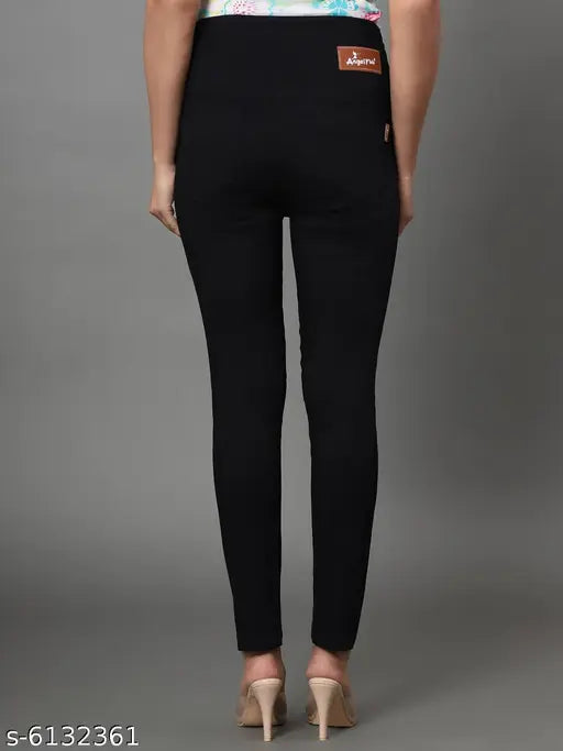 Solid black denim skinny fit stretchable high waist jeggings for women, ankle length and elastic closer style from AngelFab