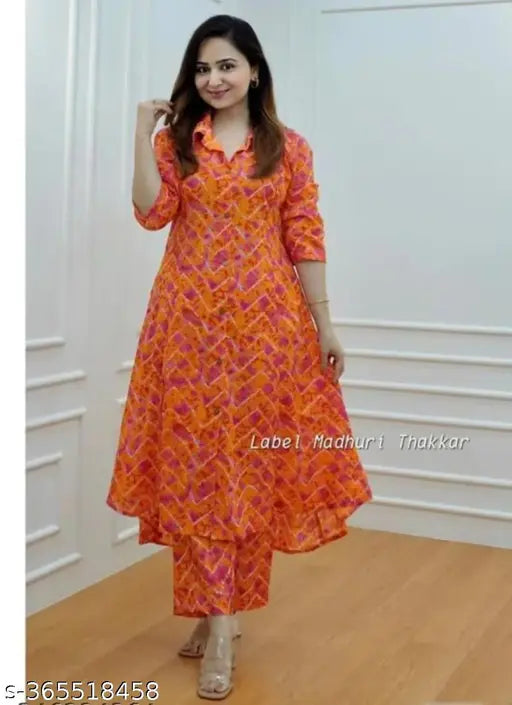 Orange cord set: Rayon printed kurta with pants, cotton and viscose rayon, three-quarter sleeves, Indian cultural fusion, all-day comfort for formal or informal events