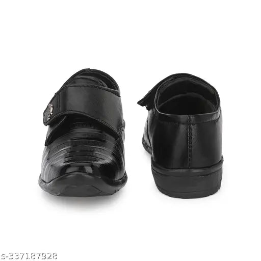 Black leather boys formal dress shoe, elastic insert at back for ease of putting on