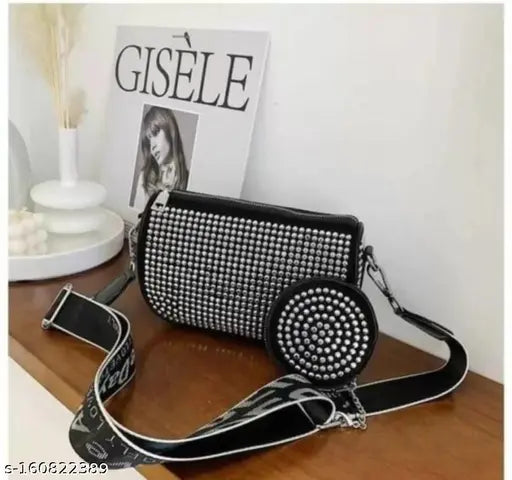 Stylish women's sling purse with black dots, adjustable strap