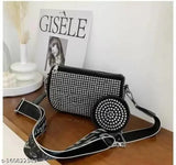 Stylish women's sling purse with black dots, adjustable strap
