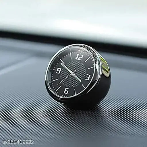 Quartz car clock in carbon fiber pattern, vent clip & adhesive tape for dashboard or console. Stainless steel, luminous night vision display. Ideal for home, office, camping, or vehicle