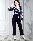 Multicolor georgette floral long jumpsuit for women, size M with long sleeves and printed pattern on display