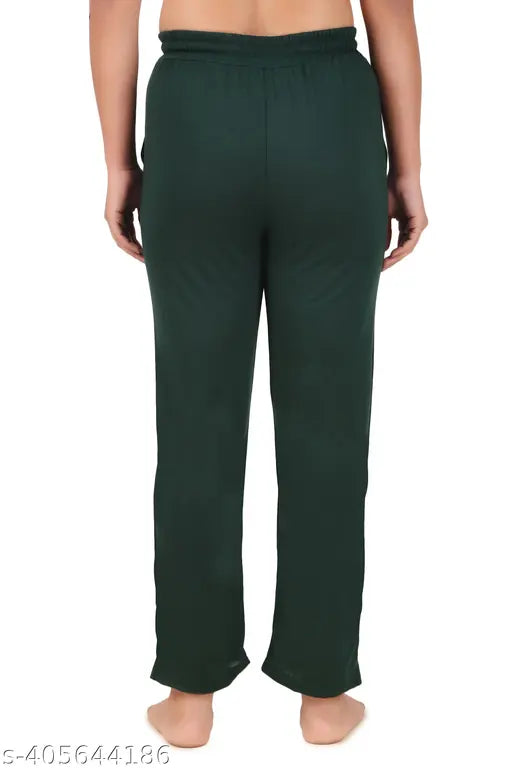 Trendy women's set of two matching sweatpants in a teal color, made of soft fabric