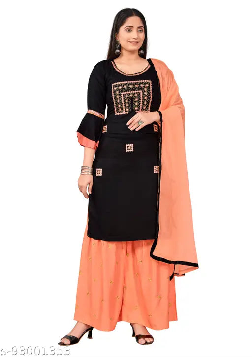 Black and orange dupatta set, featuring a black dupatta with intricate embroidery, paired with an orange skirt or kurta