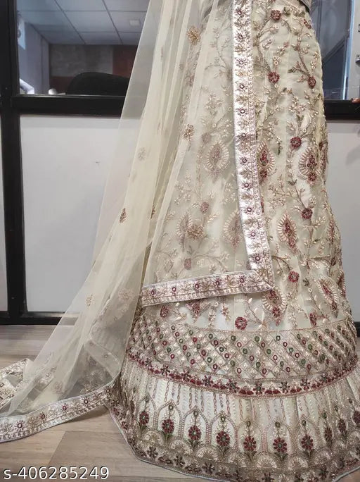Attractive cream lehenga choli set with dupatta and blouse, embroidered net fabric, free size, suitable for normal occasions and events