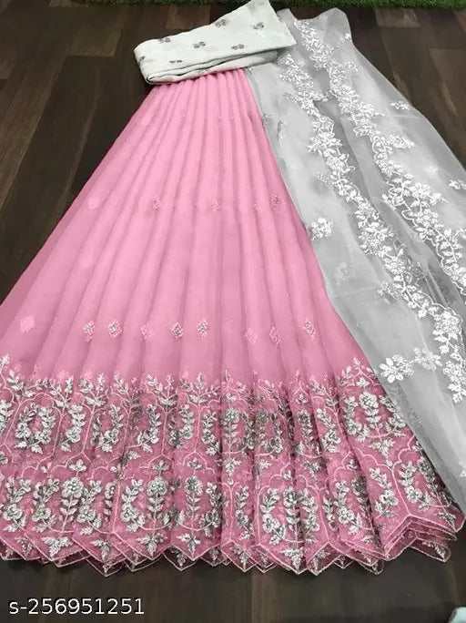 Net fabric embroidery work Lehenga with dupatta and blouse: heavy net, dupion silk, multithread embroidery, floral designs, semi-stitch cutwork border