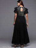 Black, solid-tone maxi dress with round neckline, keyhole detailing at the back, and statement ruffled sleeves. Ideal for festive occasions