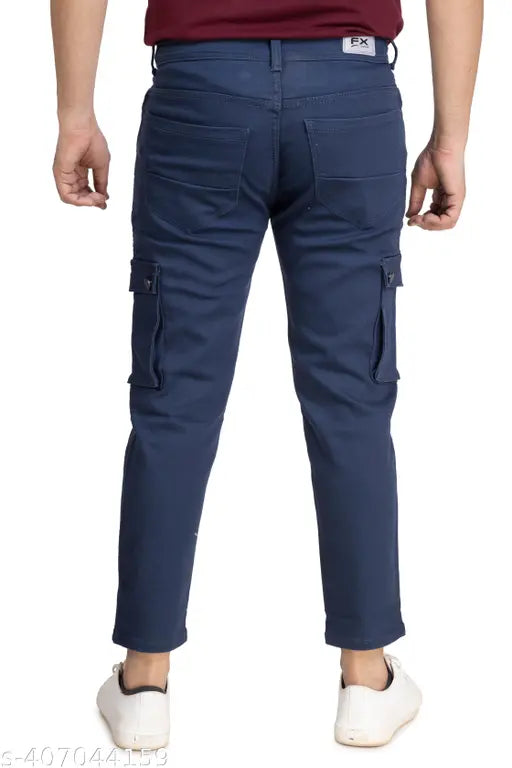 Blue cotton cargo denim for men, spacious pockets and belt loops. Traditional styling with zip fly, rivets, and contrast stitching