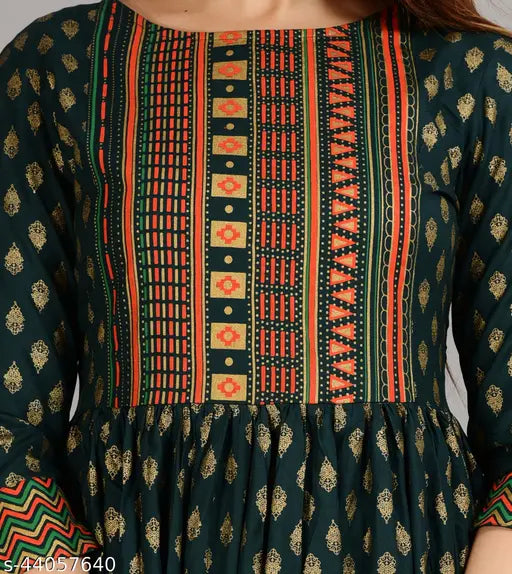 Lovelight green rayon boat neck kurti with self-design foil print, three-quarter sleeves. Beautiful and comfortable for any occasion, made in India