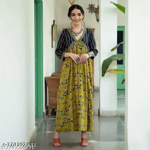 A trendy green anarkali kurti with a beautiful floral print, designed as a middi gown, for women's ethnic wear party wear