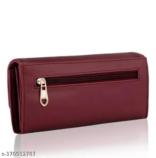 Maroon faux leather clutch wallet with zip closure and two pockets