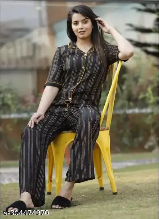 Black striped rayon nightsuit for women, stylish and comfy loungewear for relaxing evenings at home