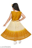 A child in a yellow and cream patterned frock