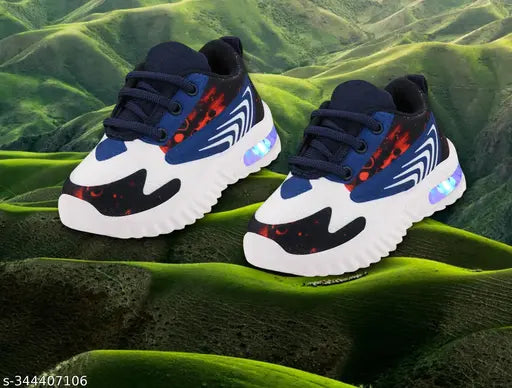 Kids blue and red light-up shoes with Velcro straps, casual style, outdoor sports design