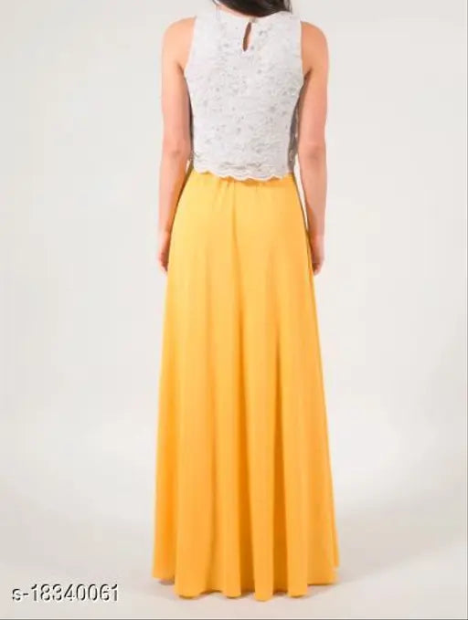 Tanvi Creations rayon flared long skirt, solid yellow color, available in sizes XS to 5XL, waist measurements 26 to 42 inches