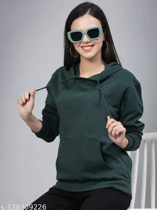Green cotton oversized sweatshirt with hood by Style Quotient, full sleeves and relaxed fit
