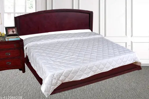 Diamond white quilt with button tufting