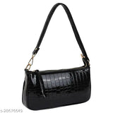 Black shoulder bag with zip closure, stylish design for women