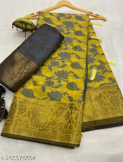 Soft, Lichi silk saree in rich yellow color with copper zari all over it and a vibrant pallu