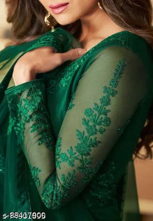 Comfy fashionable net gown with three-quarter sleeves, embroidered design. Indian women's wear on mannequin
